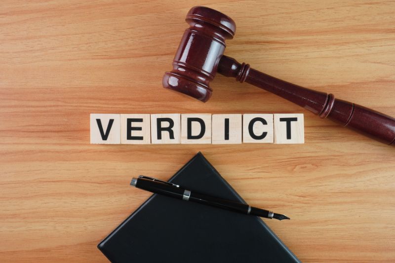 Legal verdict concept with gavel and blocks spelling 'VERDICT,' symbolizing GDPR compliance decisions